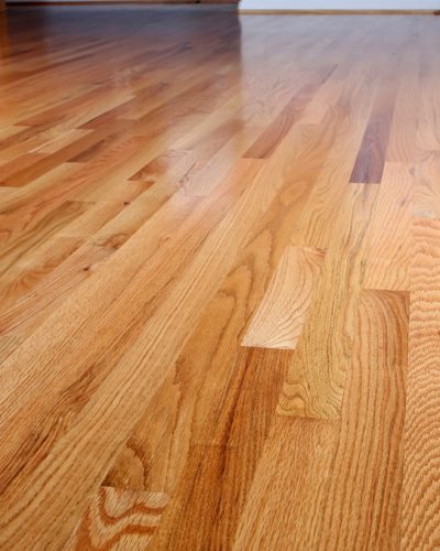 Interior,Of,A,Home,With,Refinished,Hardwood,Floors.